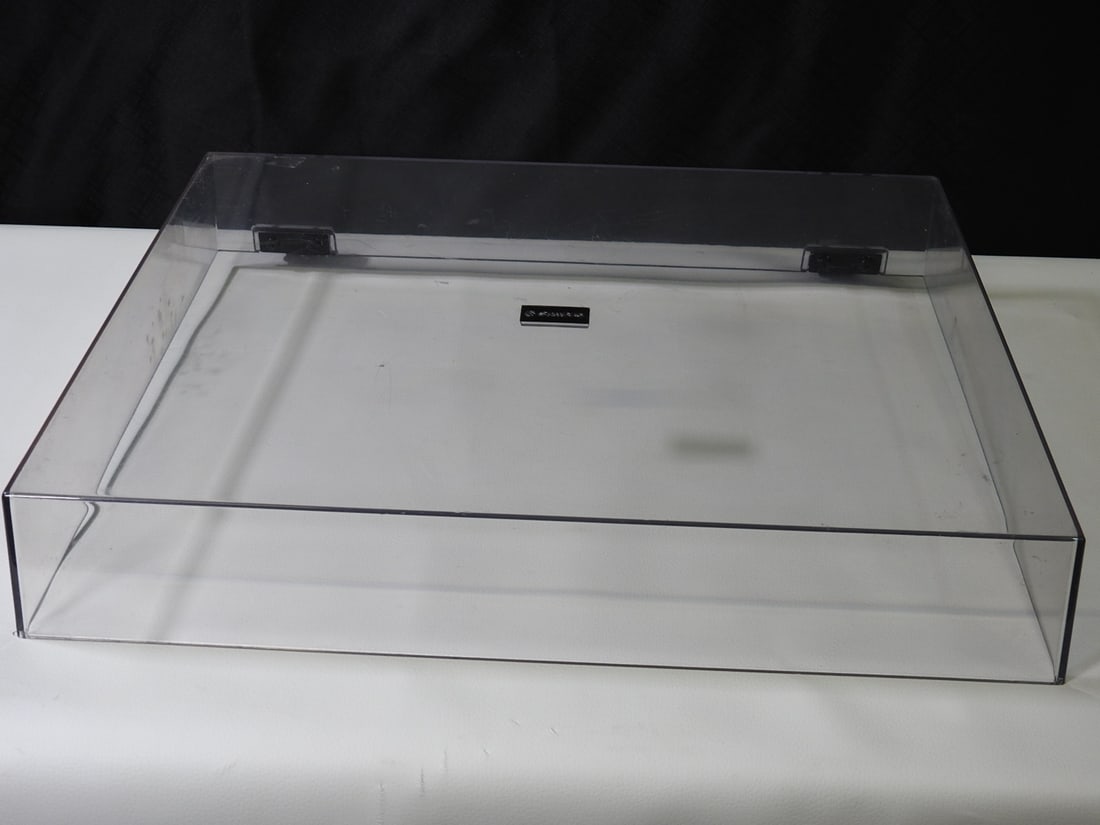 Sanyo Replacement Turntable Dust Cover: Clear replacement turntable dust cover marked Sanyo. Used cover only as shown. Approx. 3 H x 16.5 W x 12.5 D in.