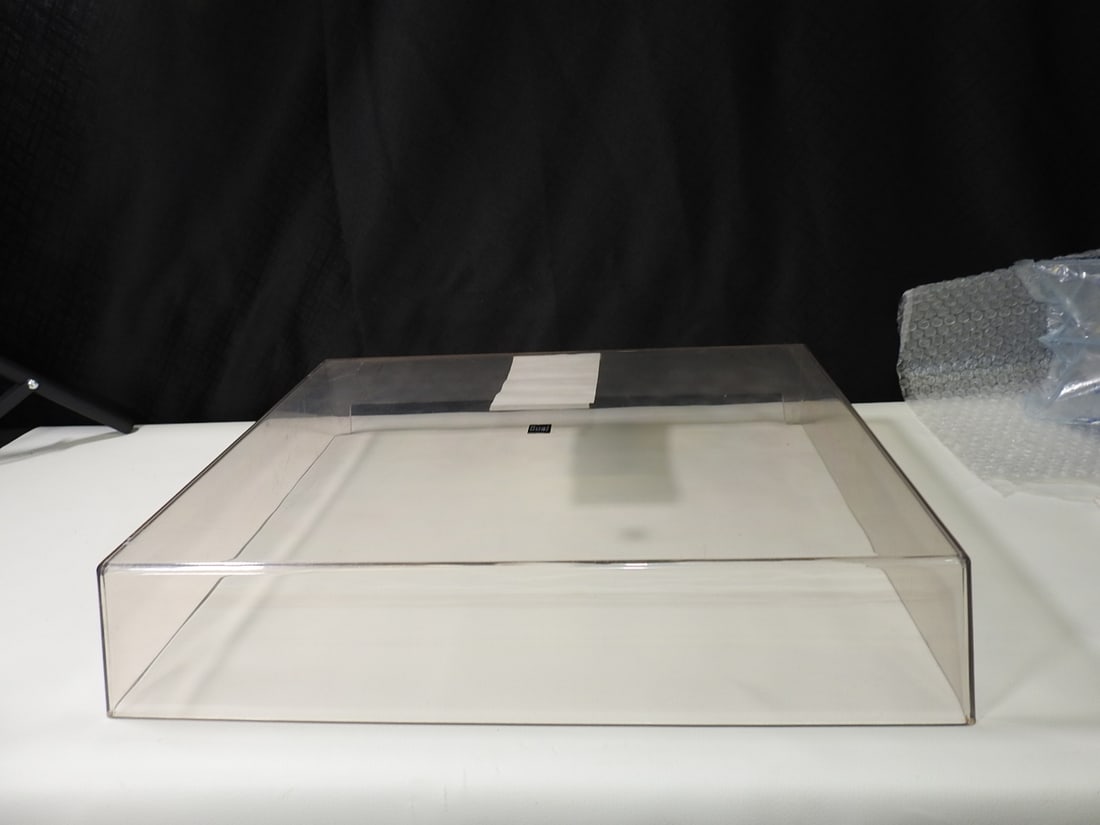 Dual CS 528 Replacement Turntable Dust Cover: Clear replacement dust cover for Dual CS 528 turntable. Used cover only as shown. Approx. 2.5 H x 17 W x 14 D in.