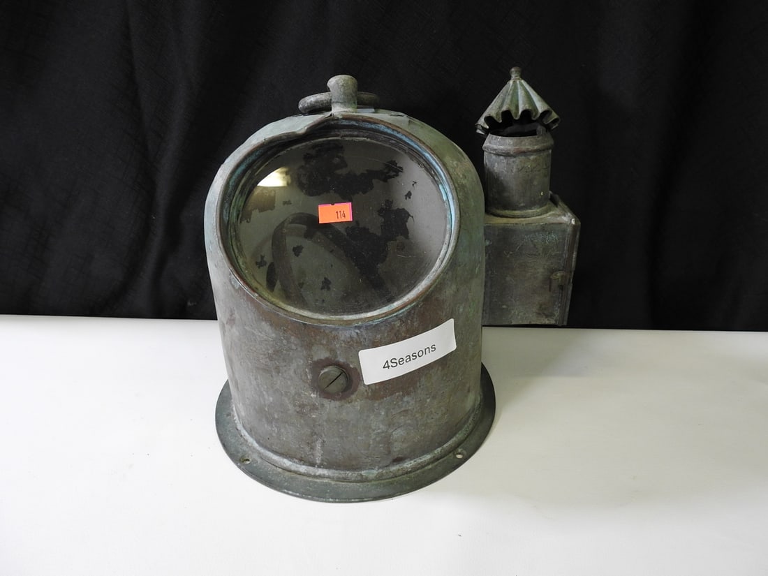 Antique Copper and Brass Maritime Anchor Oil Lantern: Antique copper and brass maritime ships anchor oil lantern. Original glass intact; burner assembly missing. Approx. 11 H x 11 W x 9.5 D in.