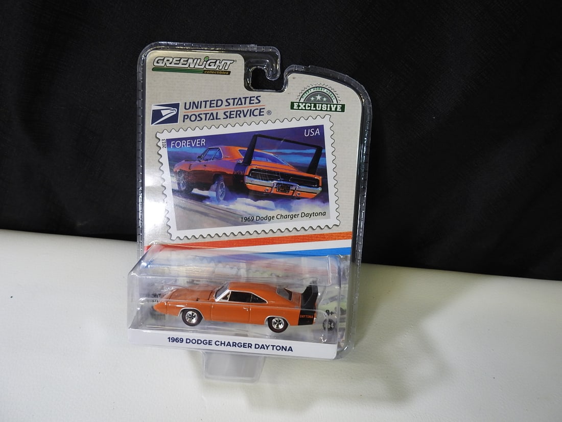 Greenlight 1969 Dodge Charger Daytona Die-Cast Car: Greenlight Collectibles 1969 Dodge Charger Daytona die-cast car in original blister packaging. Approx. 2 H x 6 W x 8 D in.