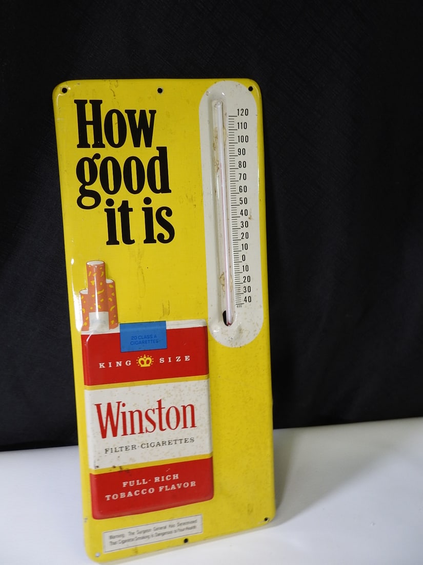 Vintage Winstons Low Tars Thermometer Sign: Vintage Winstons Low Tars thermometer advertising sign. Approx. 0.5 H x 13.5 W x 6 D in.