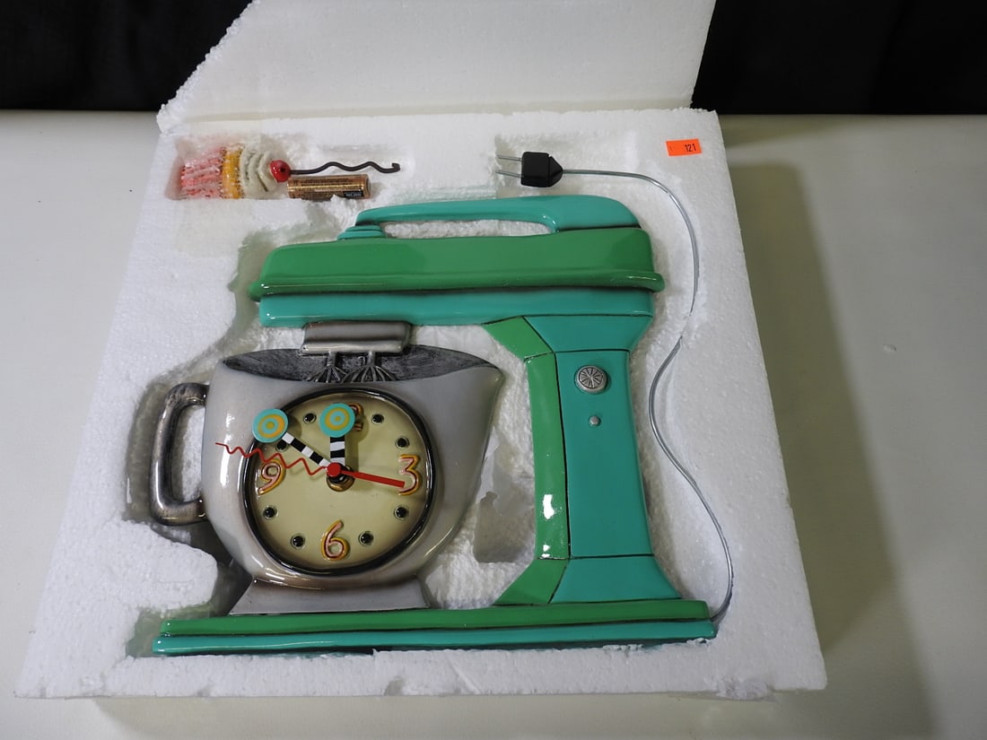 Allen Designs Mixer Clock Model P1370 New in Box: Allen Designs model P1370 wall/table clock shaped like a mixer and mixing bowl. New in box. Approx. 3.5 H x 14 W x 13.5 D in.