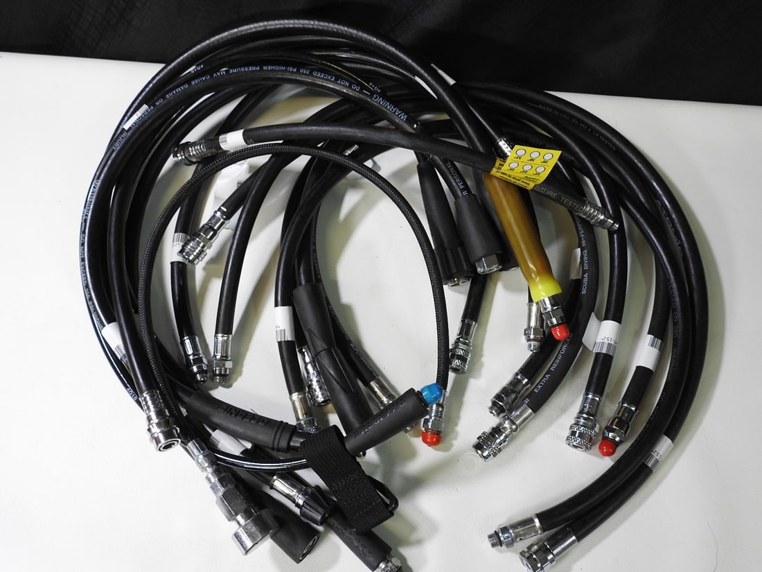 Lot of Miscellaneous Scuba Hoses, 15 Pieces: Lot of 15 miscellaneous scuba hoses as shown. Measured as packed. Approx. 3 H x 11 W x 16 D in.
