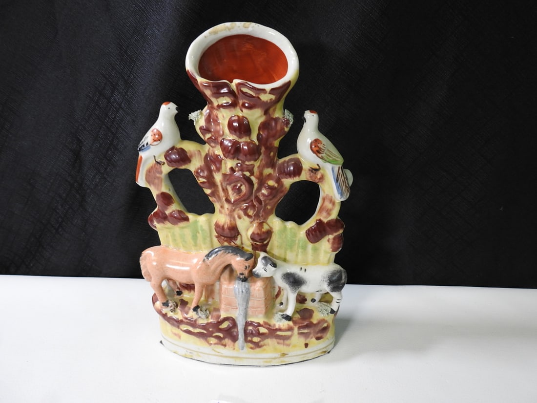 Antique Staffordshire Mood Companions Spill Vase: Antique Staffordshire flat-back spill vase with Mood Companions figural decoration. Approx. 12 H x 7 W x 3 D in.