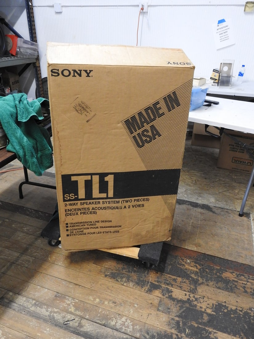 Sony SS-TL1 Speakers New in Box: Sony SS-TL1 speakers in original box. Box shows damage; contents appear clean. Approx. 39.5 H x 26.5 W x 14 D in.
