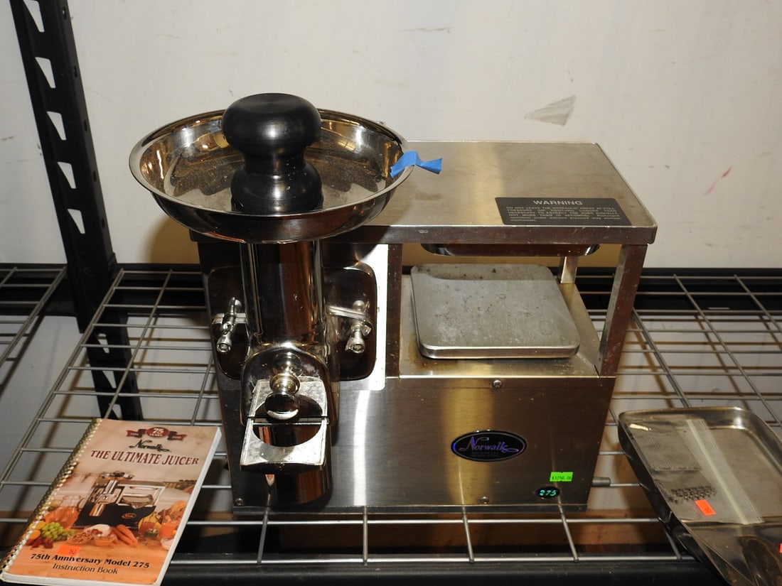 Norwalk Model 275 Stainless Hydraulic Press Juicer: Norwalk Model 275 stainless steel triturator and hydraulic press juicer with accessories shown. Tested and working. Needs deep cleaning. Approx. 19 x 17 x 16 in.