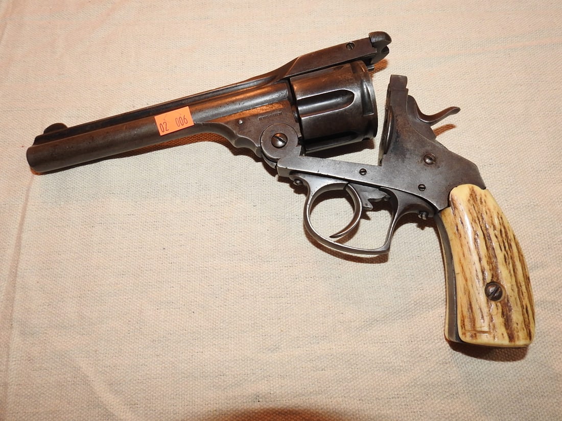 Antique Belgian Top-Break Single Action Revolver Caliber .44-40: late 19th Century Antique Belgian breakaway/top-break revolver, noted as .44-40 Winchester cartridge, with serial 6222 and DA/29 stamp marks per notes. Mechanisms and trigger pull appears to be