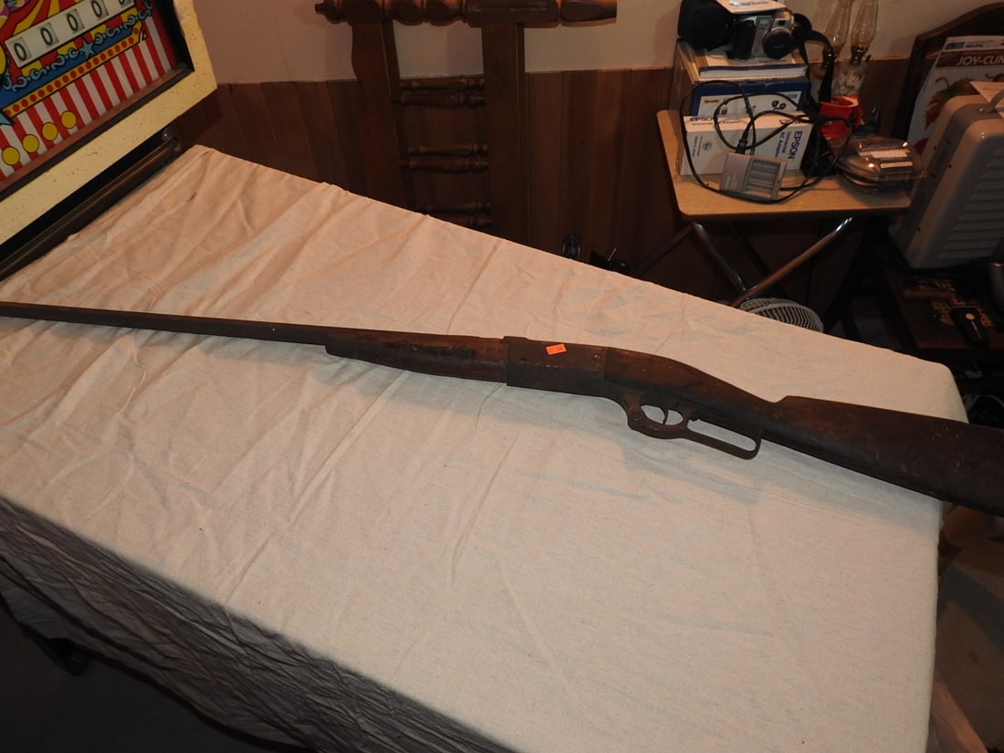 1899 Antique Non-Functional Savage .303 Lever-Action Rifle: Antique/vintage 1899 Savage lever-action rifle, noted as non-functional and chambered .303, made in Utica, New York. Missing/compromised components and heavy wear as photographed; sold as
