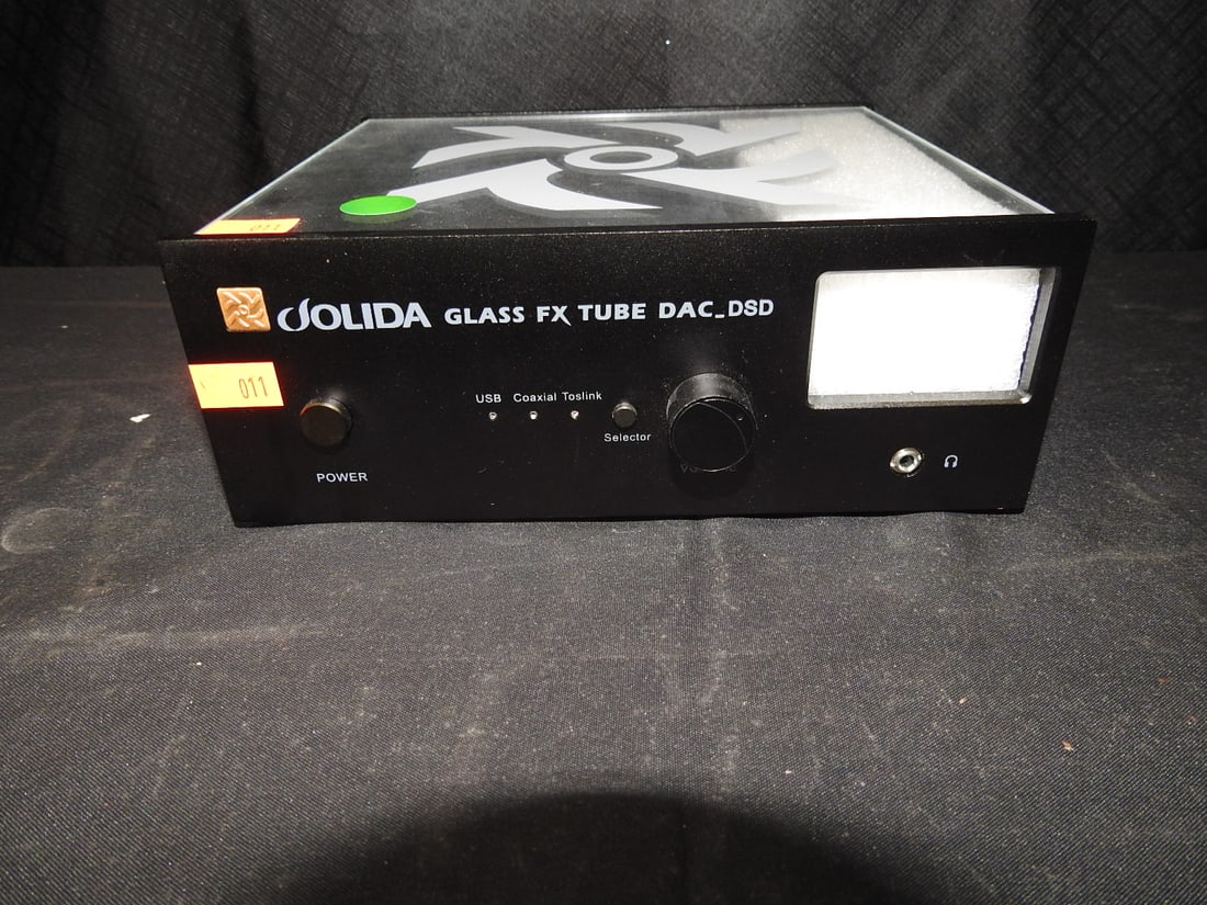 Jolida Glass FX Tube DAC DSD: Jolida Glass FX Tube DAC DSD. Appears new/open box without power cord. Approx. 3 H x 8 W x 7.5 D in.