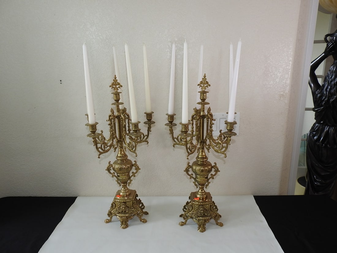 Vintage Baroque Style Solid Brass Tall Candelabra Set: Vintage Baroque style solid brass tall candelabra set by G&G with applied Bacchus / God of Wine cast decoration and ornate scroll-form arms. Approx. 26.5 x 12 x 12 in.