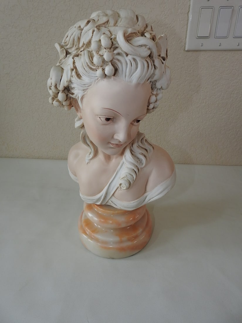 Classical French Style Bust of a Young Girl: Classical French style decorative bust of a young girl with hard resin upper section and white marble base. Approx. 16.25 x 9 x 7.5 in.