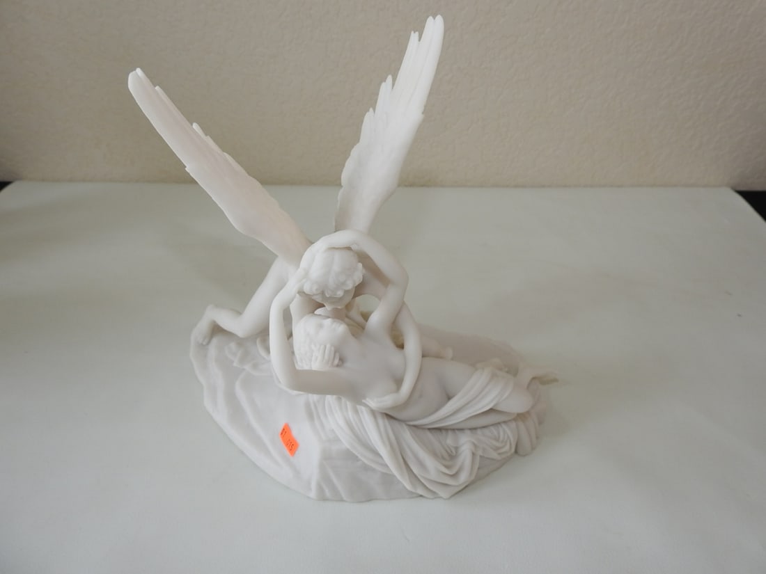 Classical Psyche Revived by Cupid Statue: Top Land Trading Myths and Legends line classical statue depicting Psyche Revived by Cupid's Kiss. Approx. 11 x 11.5 x 6.5 in.