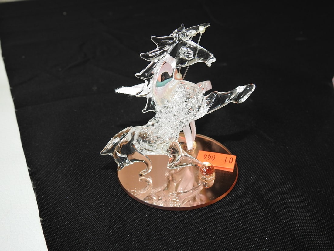 Blown Lead Crystal Unicorn with Resin Rose: Blown lead crystal unicorn figurine with resin rose accent. Approx. 3 x 3 x 2.5 in.