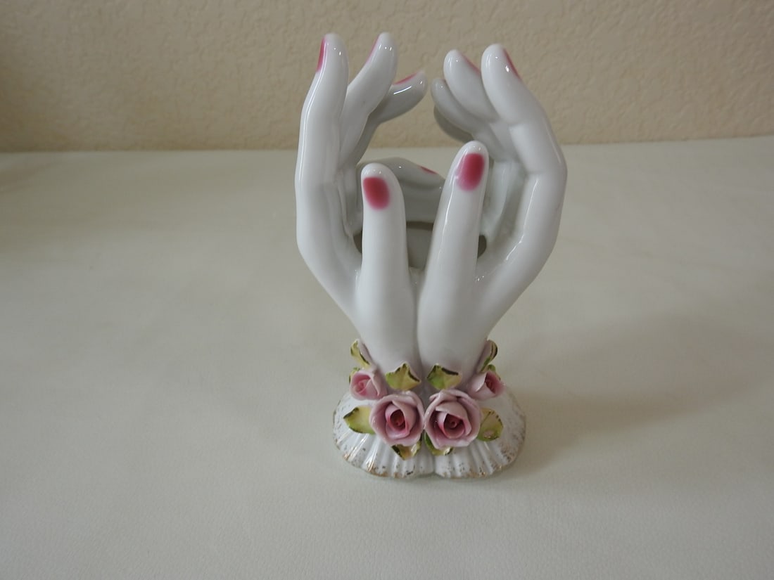 Vintage Porcelain Lady Hands Vase / Ring Holder: Vintage porcelain Lady Hands vase, ring holder, or bud vase, typically Japanese style, with rose detail at base. Approx. 6.75 x 3.25 x 2.75 in.