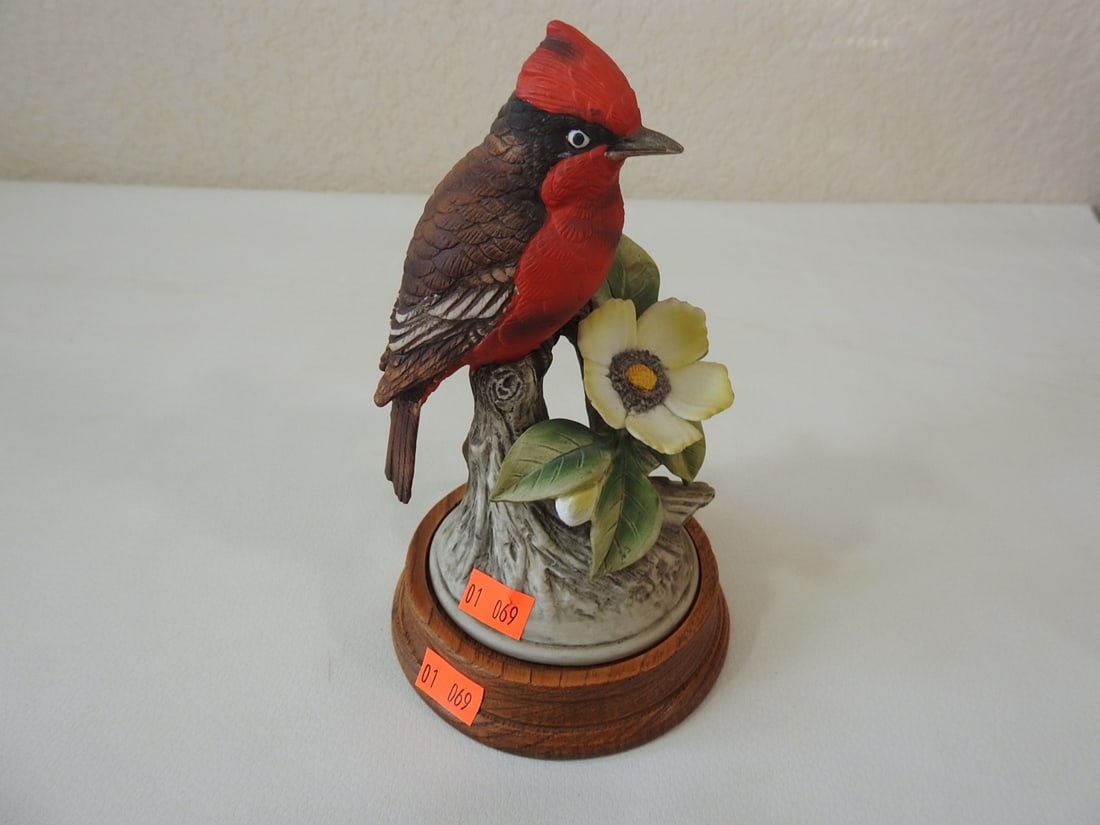 Vintage Bisque Vermilion Flycatcher Porcelain Bird Figurine: Vintage hand-painted porcelain/bisque vermilion flycatcher bird figurine, serial #8627, on wood base. Approx. 6.5 x 4 x 4 in.