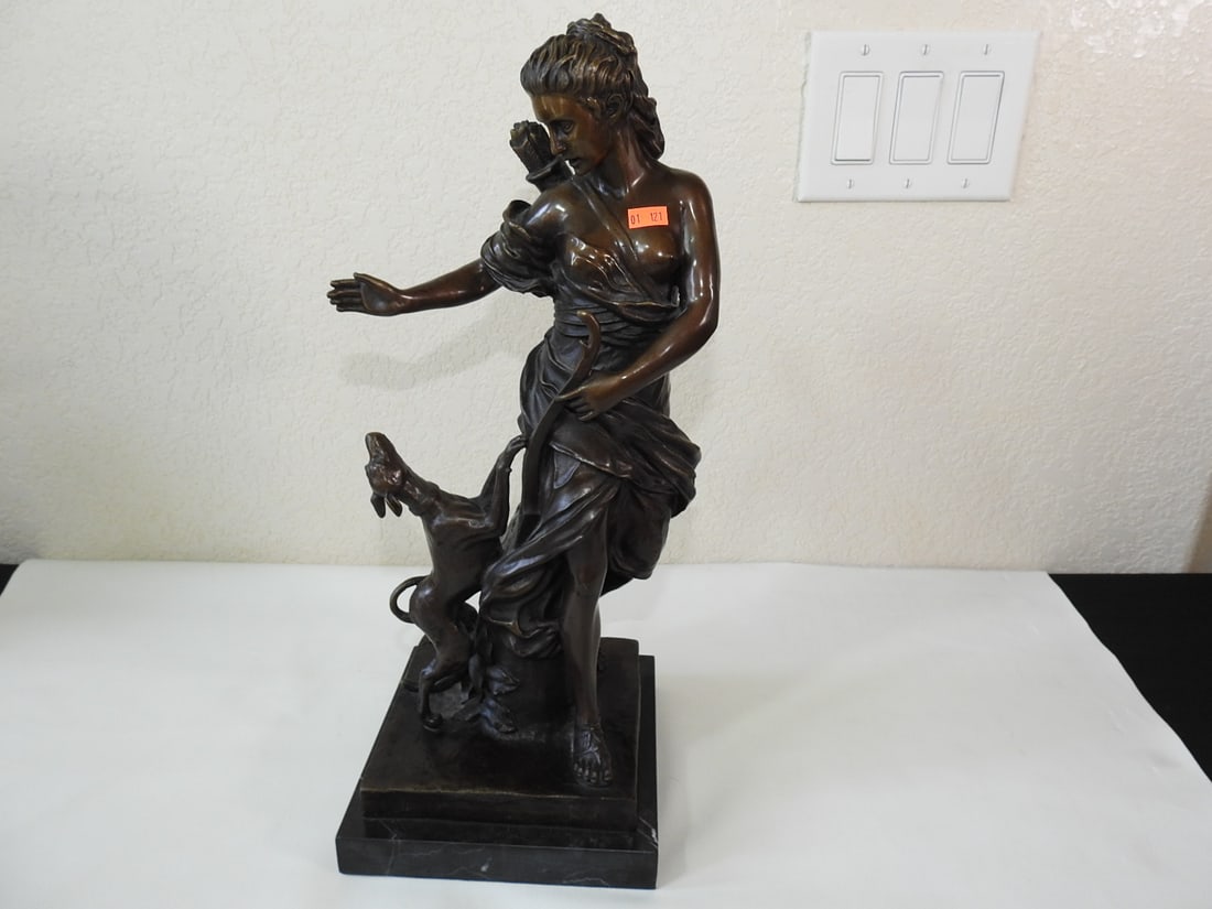 Bronze Goddess Diana Statue on Marble Base: Solid bronze goddess Diana statue mounted on black marble base, signed/noted A. Coysevox. Approx. 18.25 x 9.5 x 7.5 in.