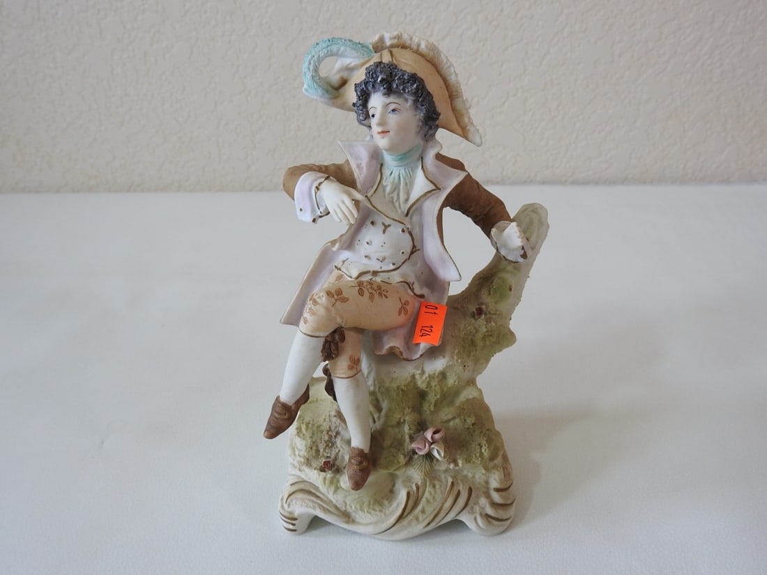 Vintage French Village Man Porcelain Figurine: Vintage French village man porcelain/bisque figurine, Japan. Approx. 8 x 4.5 x 3.5 in.