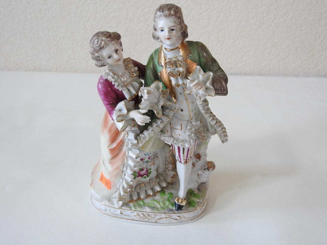 Vintage French Village Couple Porcelain Figurine: Vintage French village couple porcelain/bisque figurine, Japan. Approx. 8.5 x 6.25 x 3.5 in.