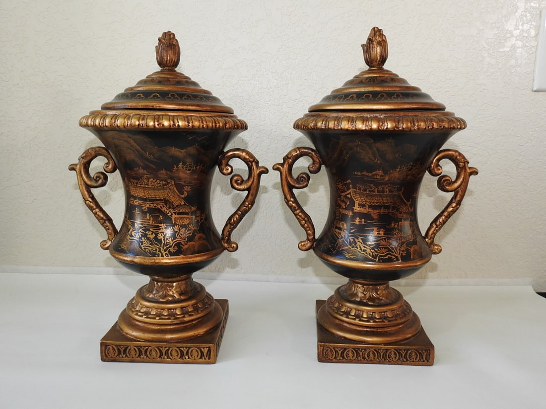 Pair of Chinese Ceramic Mantel Urns with Gold Decor: Pair of Chinese ceramic mantel urns in black with gold decoration, noted as Chinese export for the European market. Measured as a set. Approx. 16 x 10 x 8 in.