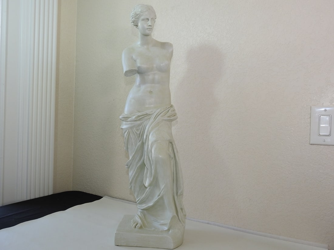 Large Venus de Milo Style Plaster Statue: Large Venus de Milo style plaster sculpture in European classical style, handcrafted in China for Design Toscano. Approx. 32 x 9 x 9 in.