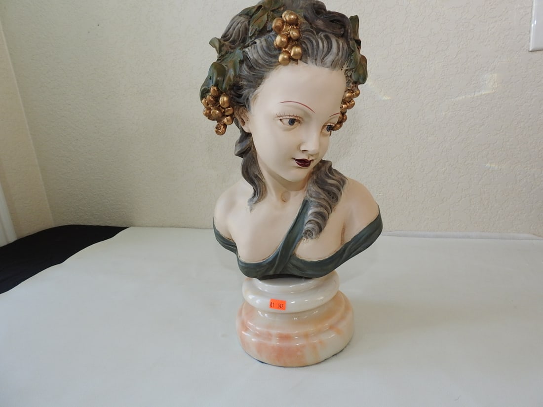 French Girl Bust on Marble Base: Painted plaster French girl bust mounted on a marble base. Approx. 16.25 x 9 x 7.5 in.