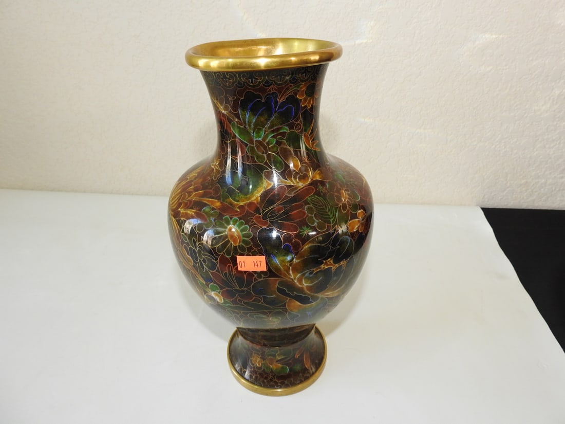 Vintage Chinese Cloisonne Vase with Lid: Vintage Chinese cloisonne vase with muted colors, brass body, and irregular round lid. Approx. 13 x 7 x 7 in.