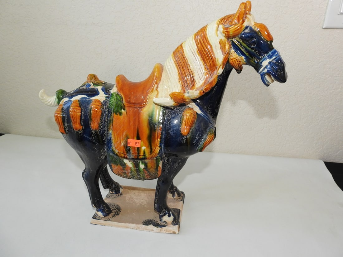 Vintage Chinese Tang-Style Sancai Horse Statue: Vintage Chinese Tang-style sancai horse statue with majolica-style glazed blue body and white mane detail. Approx. 15 x 16 x 6 in.