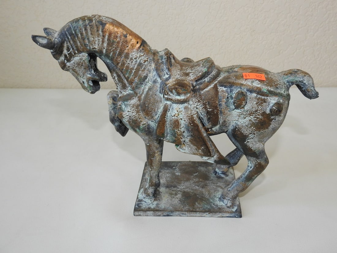Chinese Bronze Horse Statue with Oxidized Patina: Solid bronze Chinese horse statue with gold and oxidized style patina. Approx. 9.5 x 11 x 4.5 in.