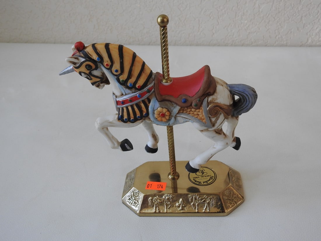 Precious Heart Limited Edition Porcelain Carousel Horse: Precious Heart limited edition porcelain carousel horse, Carousel Series #254 of 3000, serial 9113, with brass base and pole. Approx. 7.5 x 7 x 3.25 in.