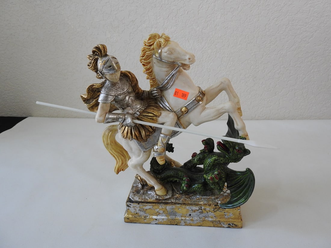 Faux Marble Saint George Slaying Dragon Statue: Hand-painted resin statue depicting Saint George on horseback slaying a dragon, with faux marble body and gold/silver gilt base. Approx. 11.25 x 14 x 5.5 in.