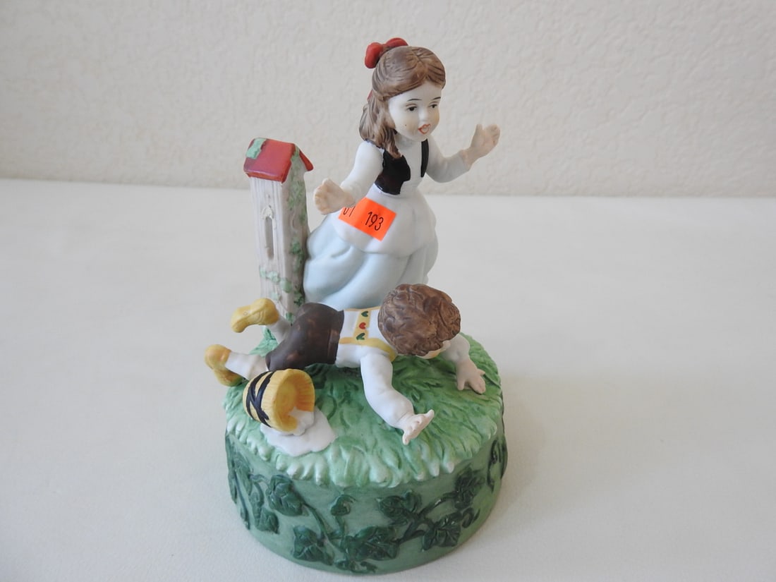 Brenda Thomas “Jack and Jill?? Porcelain Music Box: Vintage “Jack and Jill” porcelain music box from The Once Upon a Time Collection, artist Brenda Thomas, copyright 1989. Tested; not working and needs tuning. Approx. 7 x 5.5 x 5.5 in.