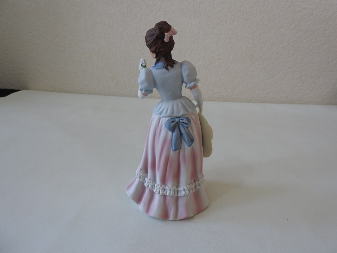 Homeco Victorian Lady Porcelain Figurine #1452: Vintage Homeco Victorian lady porcelain figurine, made in Taiwan, model #1452. Approx. 8.5 x 4.5 x 3.75 in.