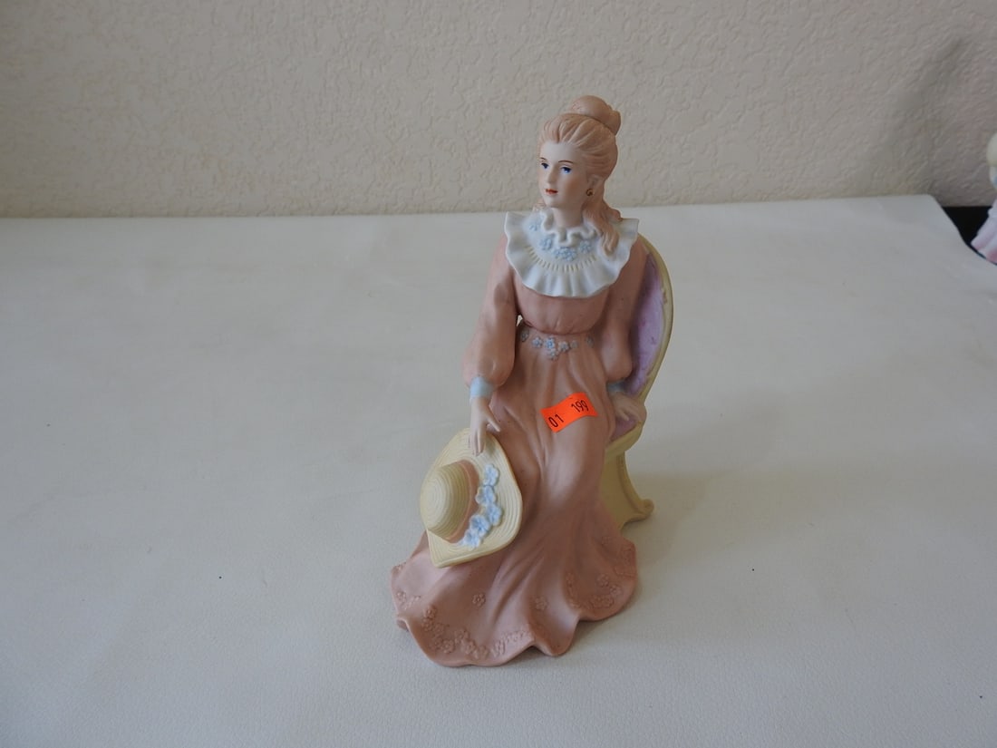 Homeco Victorian Seated Lady Porcelain Figurine #1439: Vintage Homeco Victorian seated lady porcelain figurine, made in Taiwan, model #1439. Approx. 7 x 3.5 x 3.5 in.