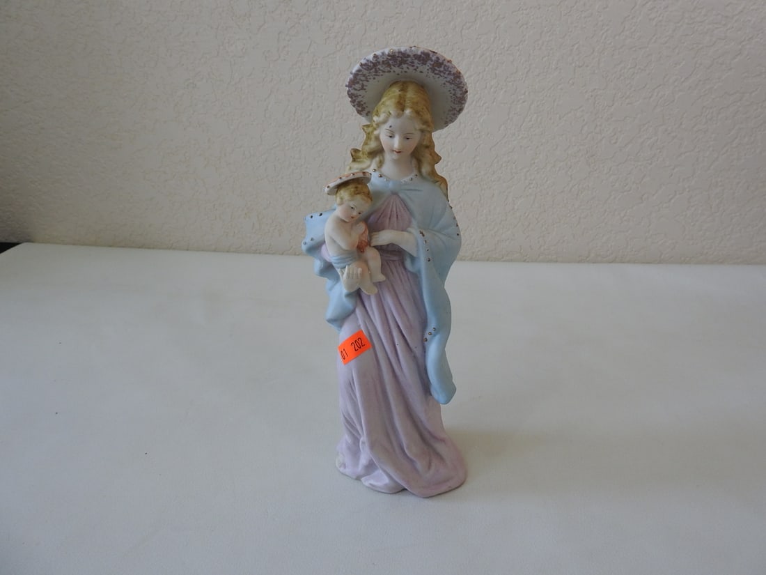 Vintage Madonna and Child Bisque Porcelain Figurine: Vintage Japanese import hand-painted bisque porcelain Madonna and Child figurine with gold accents. Approx. 10.5 x 4.5 x 3 in.