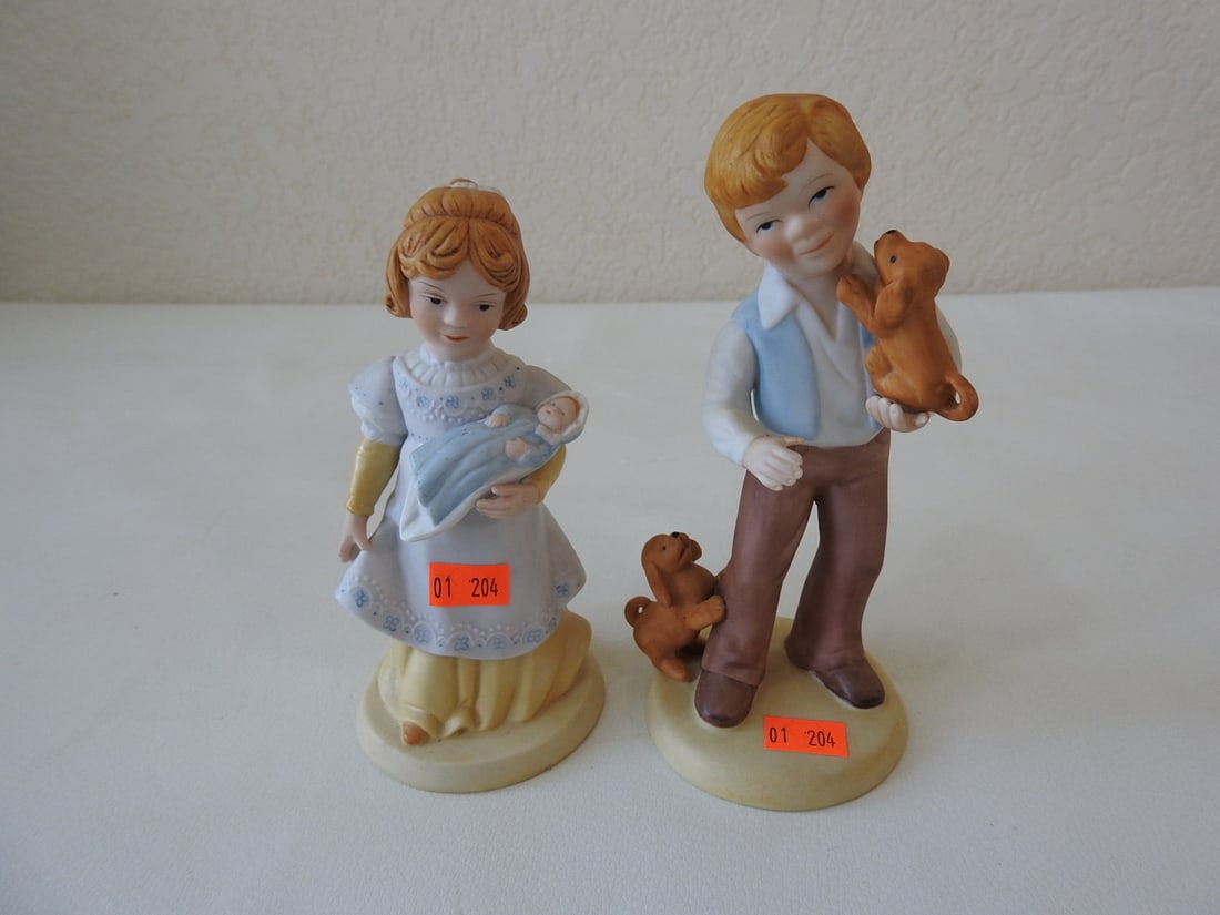 Avon Victorian Brother and Sister Porcelain Figurines: Set of two Avon porcelain bisque Victorian brother and sister figurines, copyright 1981, titled “A Mother’s Love” and “Best Friends.” Approx. 6.5 x 6 x 3 in.