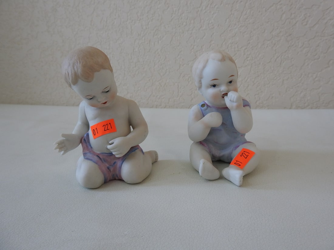 Vintage Japan Bisque Piano Babies Set of 2: Set of two vintage Japan bisque piano babies, hand-painted, serial #989. Approx. 4.5 x 4 x 5.5 in.