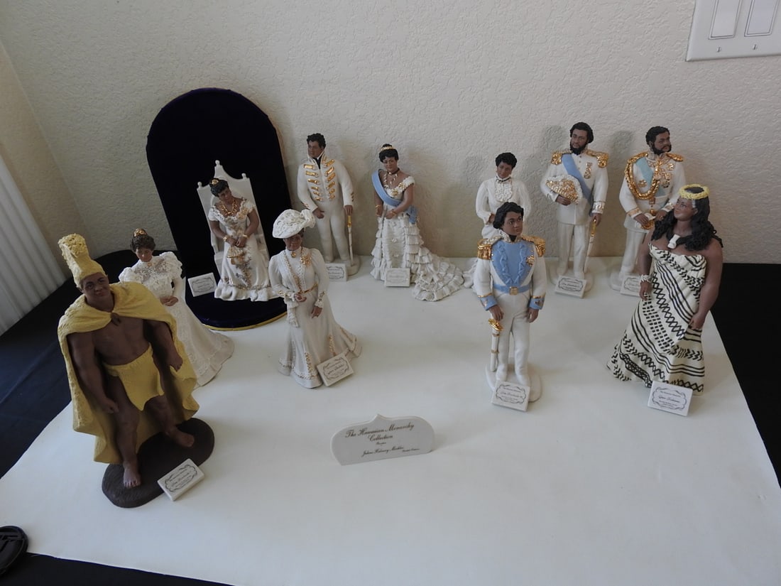 Hawaiian Monarchy Collection by Julene Halverson Meckler: The Hawaiian Monarchy Collection by Julene Halverson Meckler, limited edition porcelain bisque figure collection with individual name plaques. Displayed as a group. Approx. 16 x 16 x 26 in.