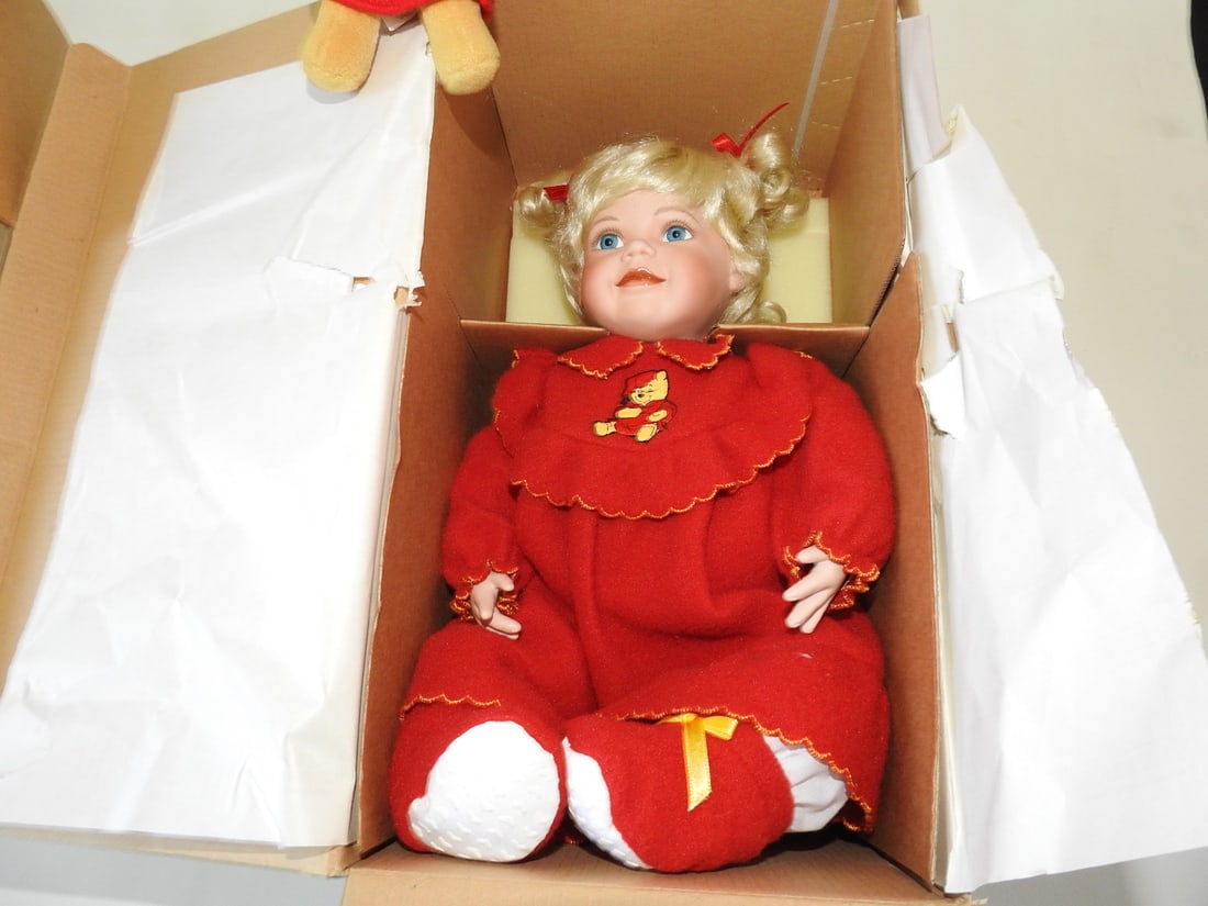 Ashton-Drake “Let’s Read a Bedtime Story?? Pooh Doll: Ashton-Drake Galleries “Let’s Read a Bedtime Story” Pooh doll, complete set with certificate of authenticity. Approx. 14 x 7.5 x 7 in.