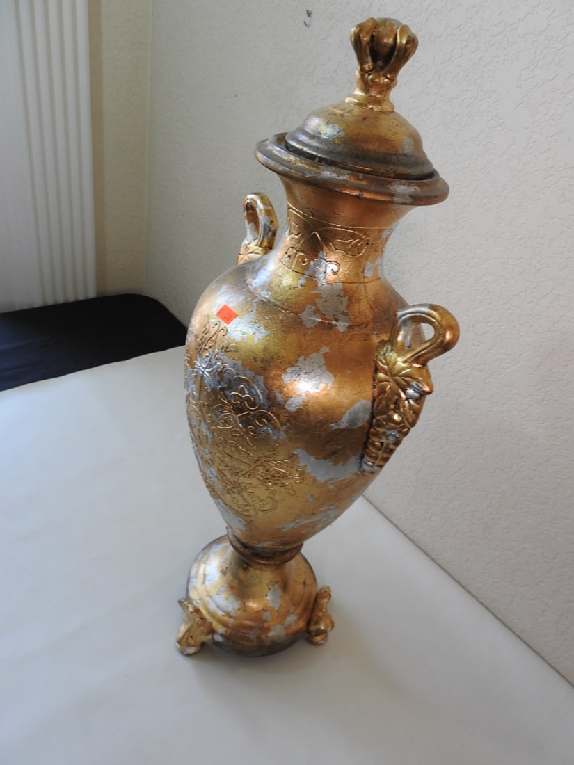 Gold and Silver Leaf Classical Ceramic Urn: Classical style ceramic urn with gold and silver leaf finish and three-footed base. Approx. 26 x 11 x 9 in.