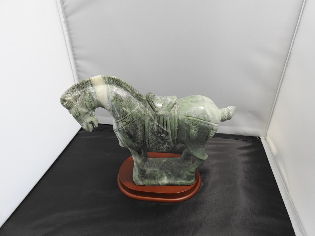 Carved Green Marble Tang Dynasty Horse on Wood Base: Vintage carved green marble Tang Dynasty style horse with jade-like body and wooden base. Approx. 8 x 9.5 x 4 in.