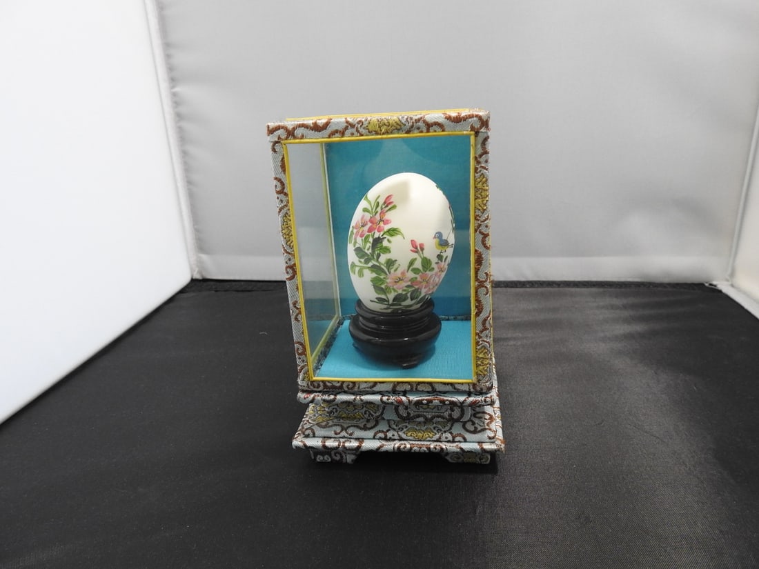 Hand-Painted Japanese Egg in Glass Display Case: Genuine egg, hand-painted and artist signed, custom fitted and displayed in a glass box. Approx. 5.5 x 3.25 x 3.25 in.