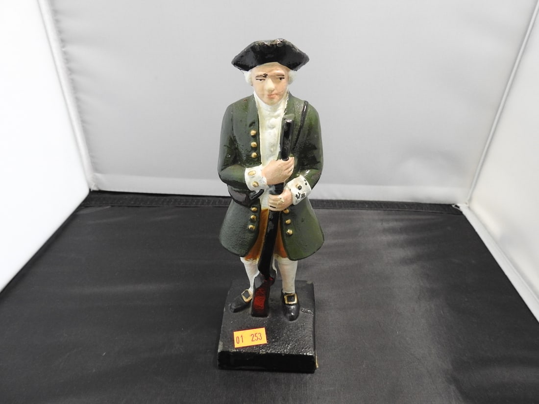 Green Cast Metal French Revolutionary Soldier Figure: Green hand-painted cast metal French Revolutionary soldier figure with paint chipping noted. Approx. 7.5 x 3 x 2.5 in.