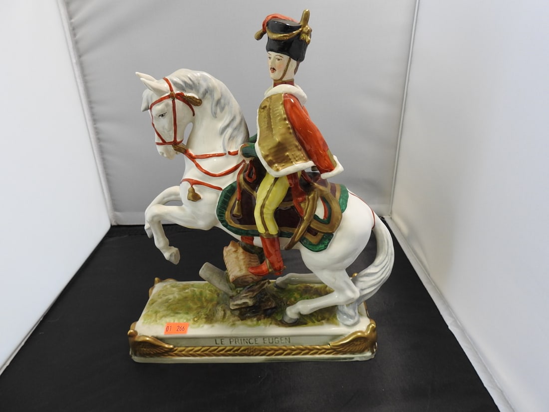 Scheibe-Alsbach “Le Prince Eugene?? Porcelain Figure: Scheibe-Alsbach hand-painted porcelain figure titled “Le Prince Eugene” with gold gilt accents. Approx. 11 x 4 x 9 in.