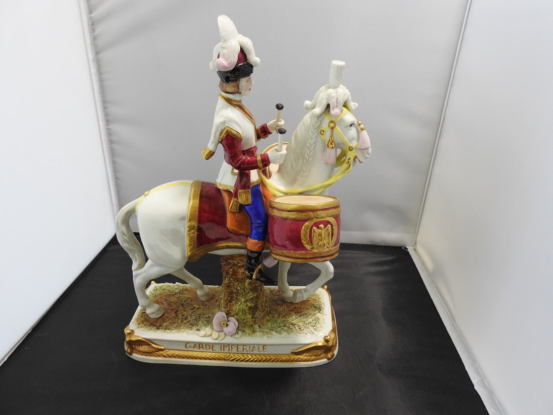 Scheibe-Alsbach “The Grand Imperial?? Porcelain Figure: Scheibe-Alsbach hand-painted porcelain figure noted as “The Grand Imperial, ” with gold gilt accents. Approx. 11 x 6 x 8.5 in.