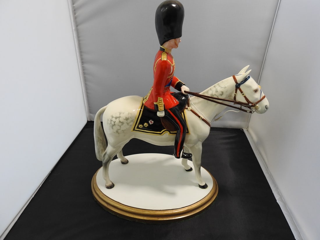 Beswick HRH Duke of Edinburgh Mounted Horse Figure: Beswick England HRH Duke of Edinburgh mounted horse figure permanently affixed to wooden base. Approx. 12 x 6.25 x 11 in.