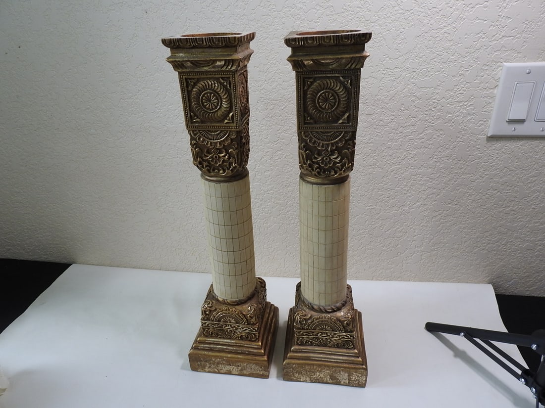 Gold Gilt Resin Pillar Candle Holders: Set of gold gilt resin pillar candle holders, measured as a set. Holds approx. 3 in. diameter candles. Approx. 21 x 5.5 x 10.75 in.