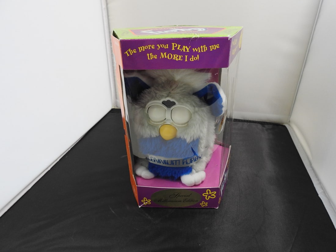 1999 Special Limited Edition Millennium Furby in Box: 1999 Special Limited Edition Millennium Furby, complete set in box. Opened, tested working, like new condition with minor signs of wear to box. Approx. 8.5 x 6.5 x 6.5 in.