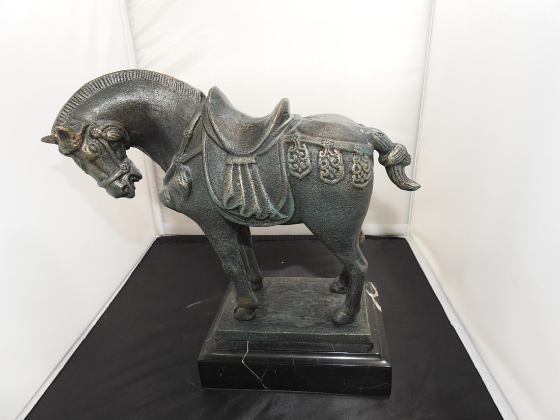 Tang Dynasty Bronze Horse Statue: Tang Dynasty Bronze Horse Statue. Black marble base, Approx. 11.5 x 6 x 9.5 in.