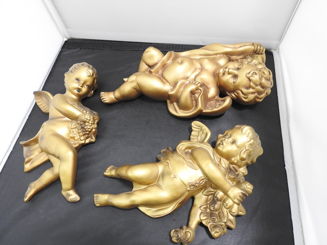 Set of 3 Wall Hanging Cherub Ornaments: Set of 3 Wall Hanging Cherub Ornaments. 2 smaller ones made in Japan, Made of Ceramic, The larger one Homco #1100 Hollow Resin, measured as set Approx. 10.5 x 10 x 4 in.