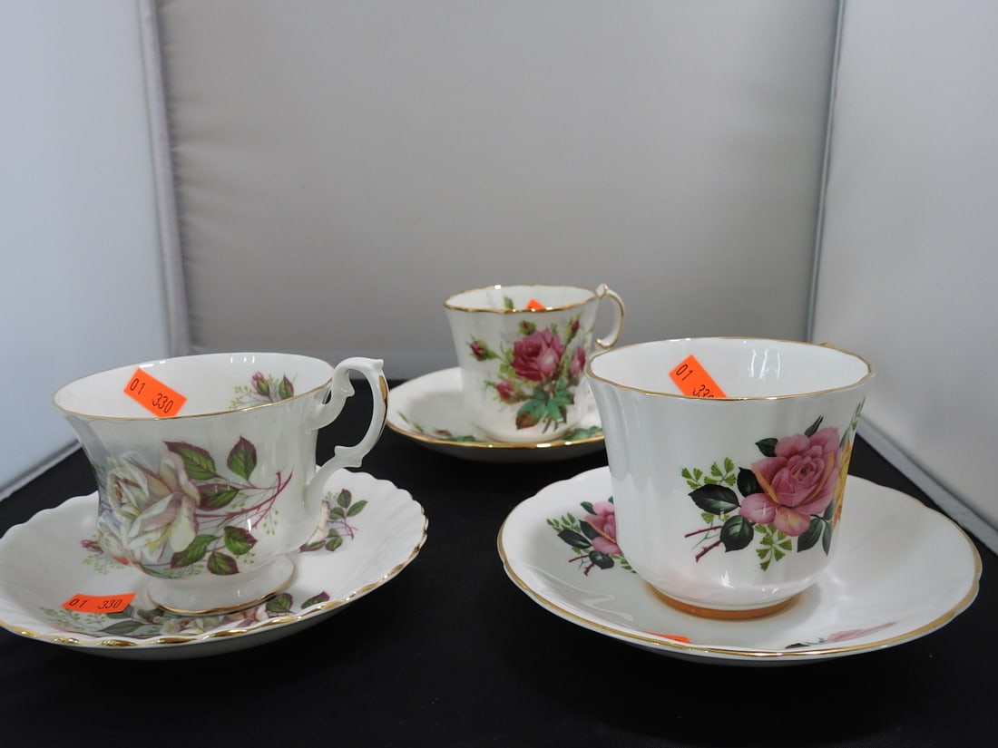 Set of 3 Vintage Bone China Teacup and Saucers: Set of three vintage bone china teacups and saucers with matching patterns; see photos for individual designs. Measured as packed. Approx. 10 x 6 x 6 in.